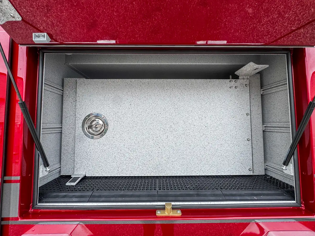 Compartment interior close-up showing vent and upper corner wiring.